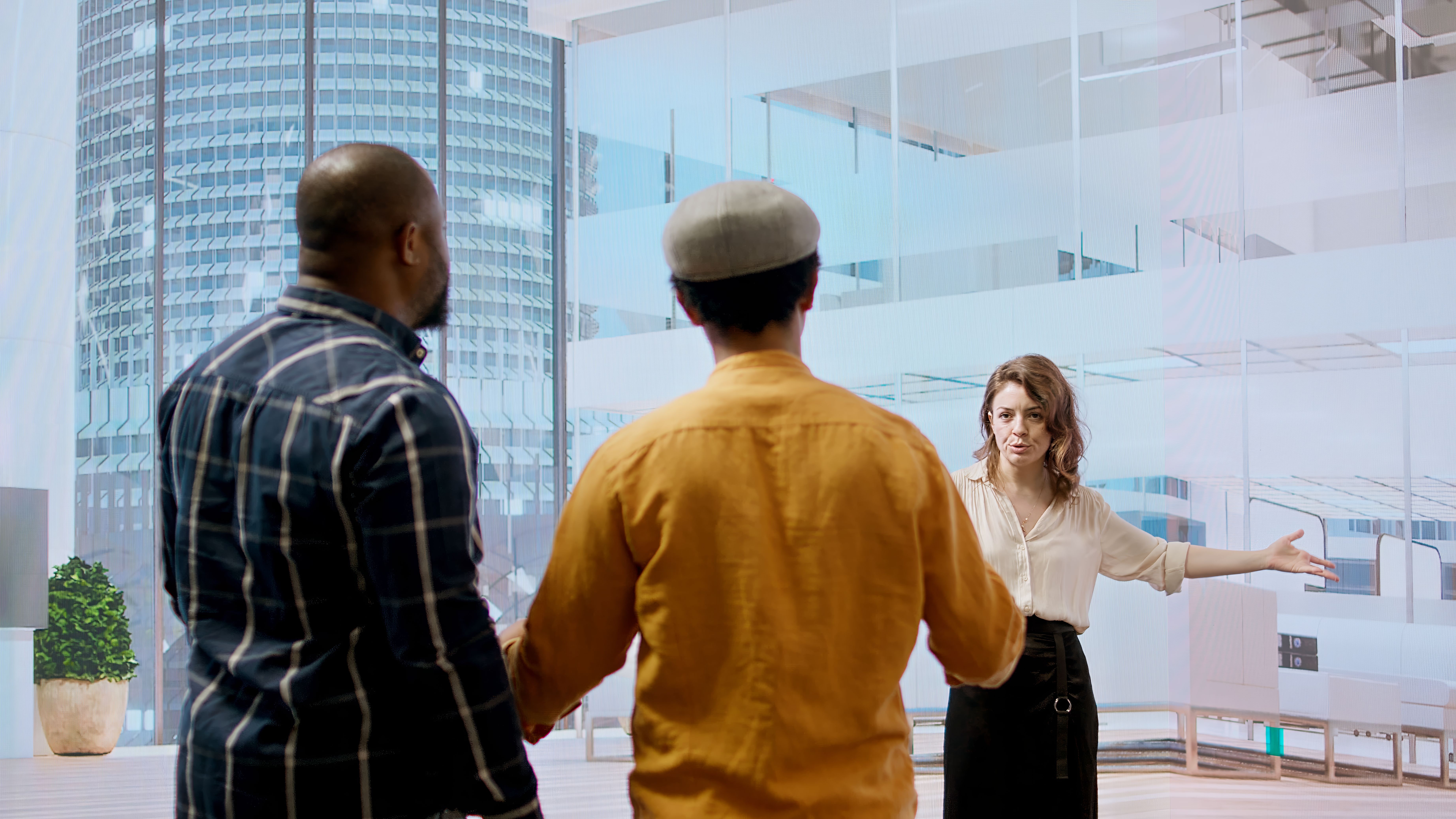 business-professionals-real-estate-agent-evaluating-detailed-blueprints.jpg